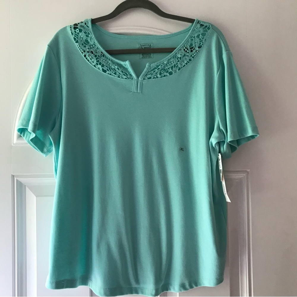 NWT. Beautiful sea foam green shirt.